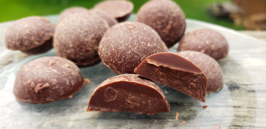 close-up of dark chocolate disks